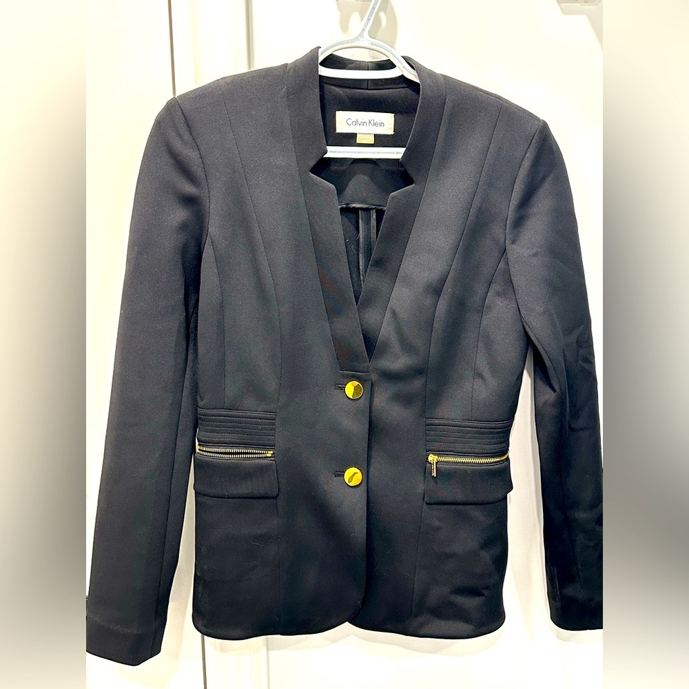 Calvin Klein black and gold blazer in size 02.